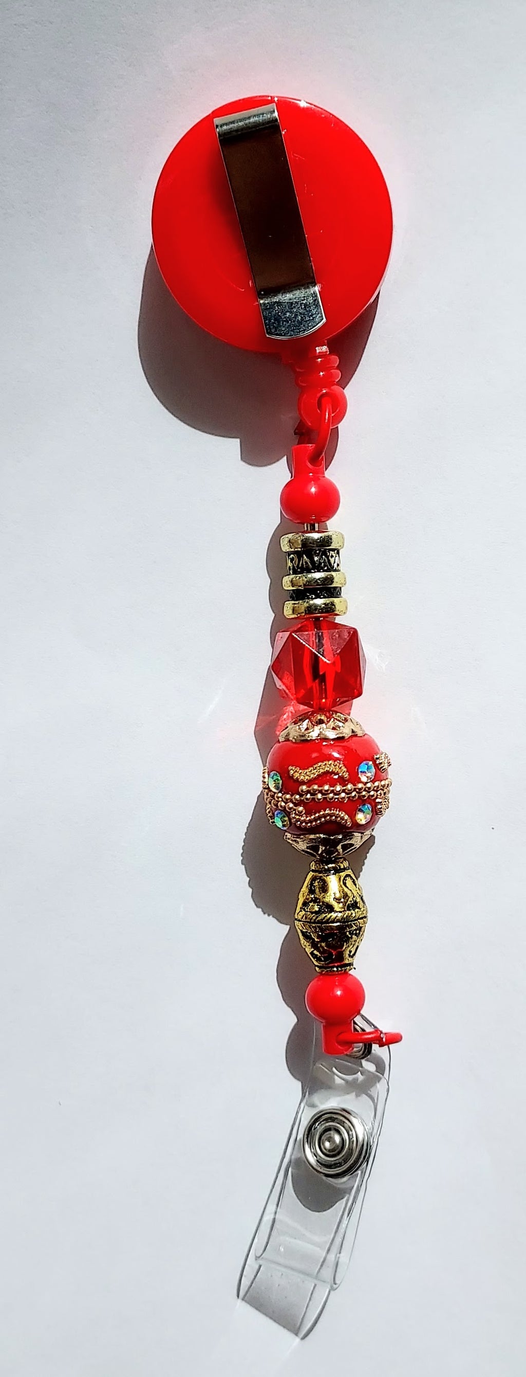 The Red Ultimate 3-in-1 Beaded Pen, Badge Reel & Fidget Set