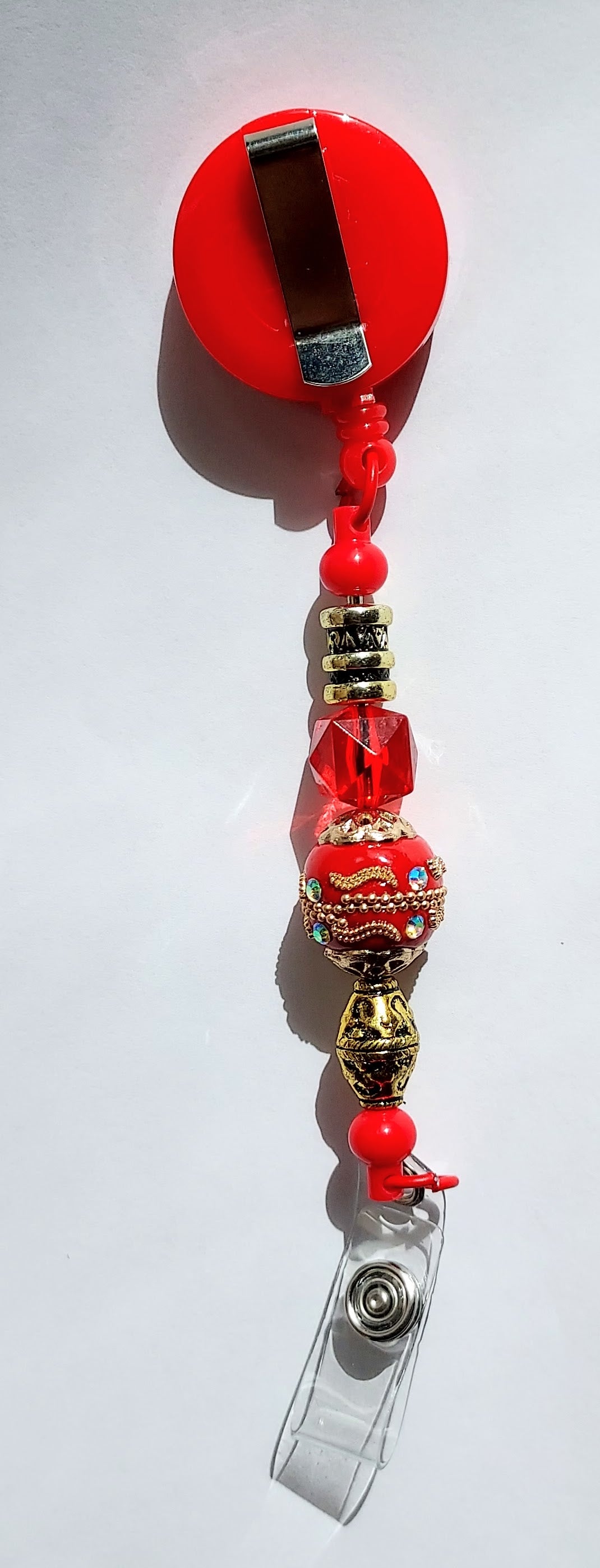 The Red Ultimate 3-in-1 Beaded Pen, Badge Reel & Fidget Set
