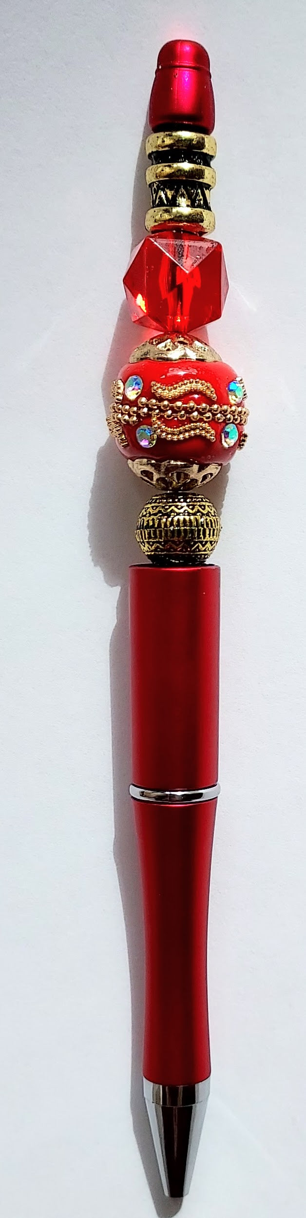 The Red Ultimate 3-in-1 Beaded Pen, Badge Reel & Fidget Set