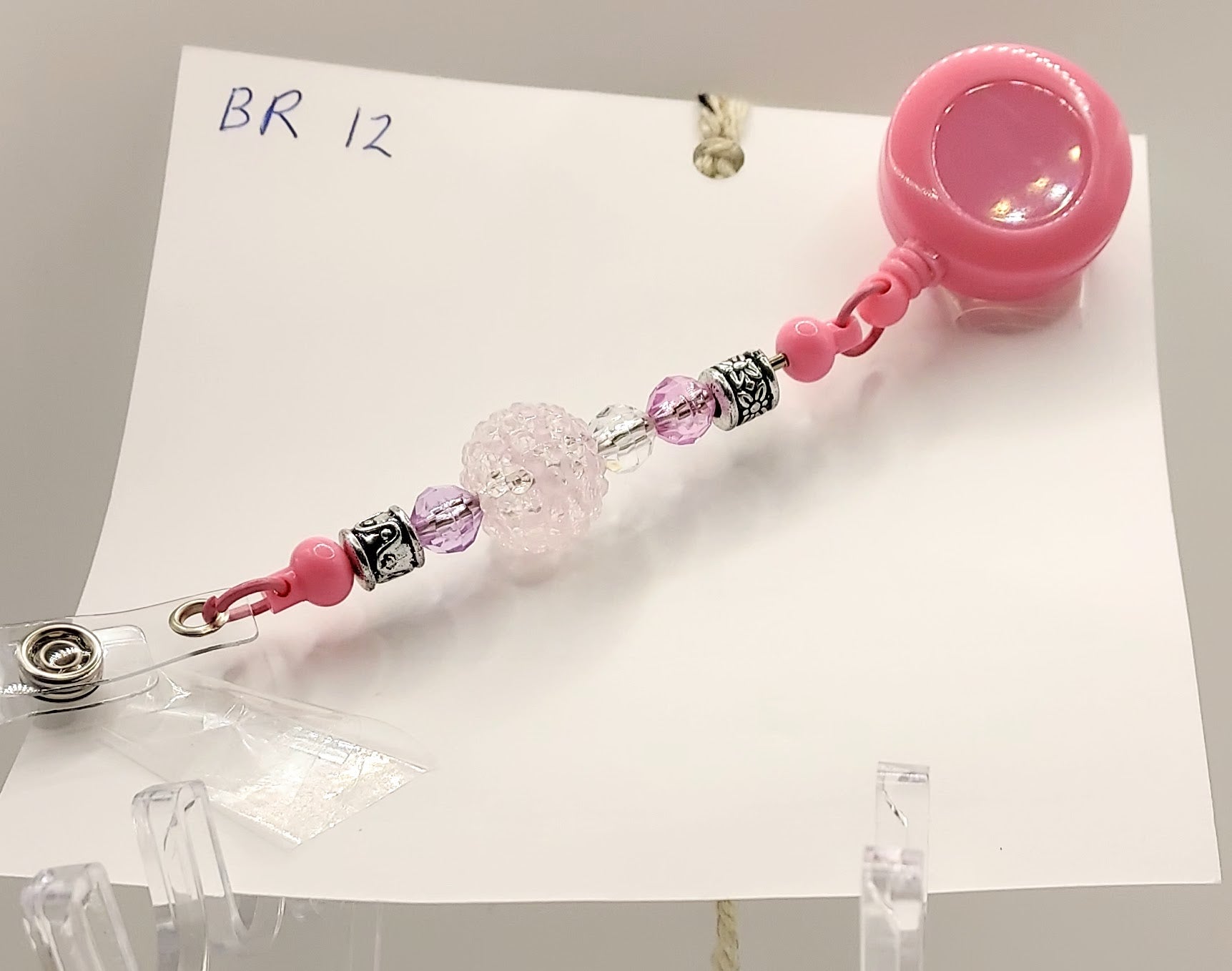 One of a Kind Pink Fidget Badge Reel