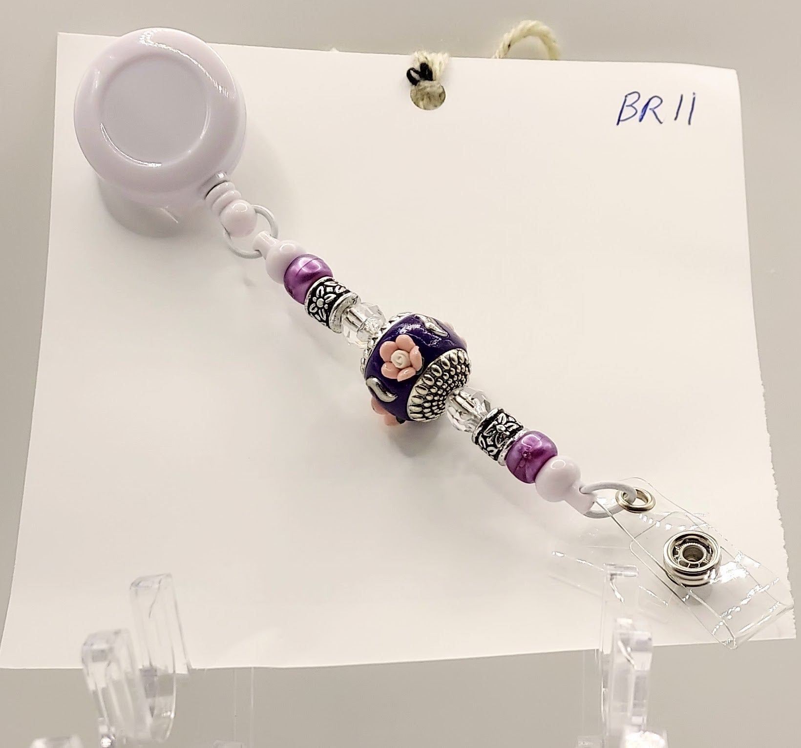 One of a Kind Purple and White Badge Reel