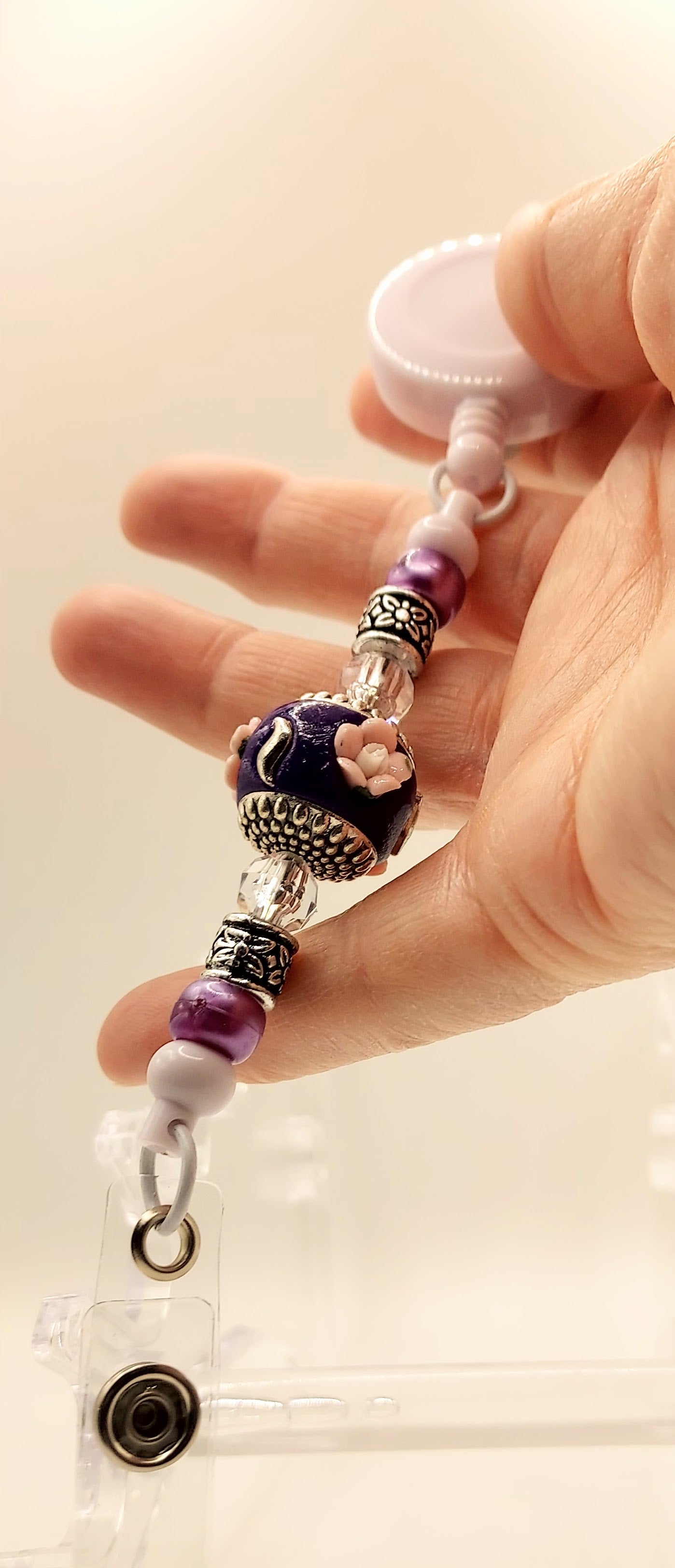 One of a Kind Purple and White Badge Reel
