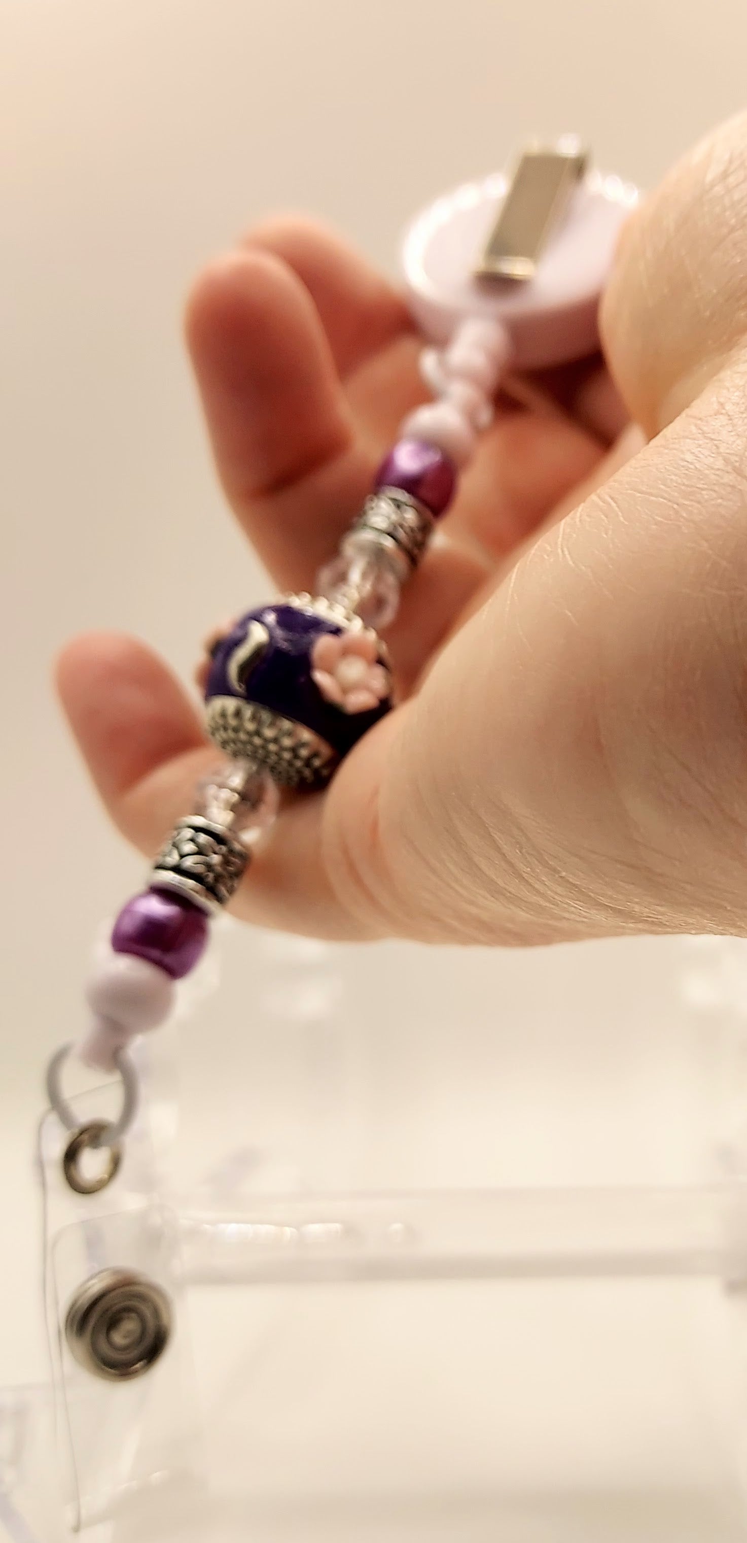 One of a Kind Purple and White Badge Reel