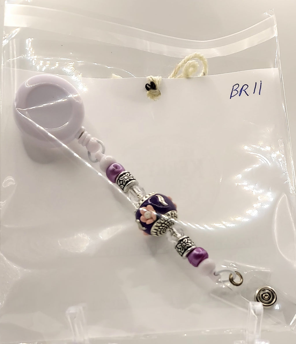 One of a Kind Purple and White Badge Reel