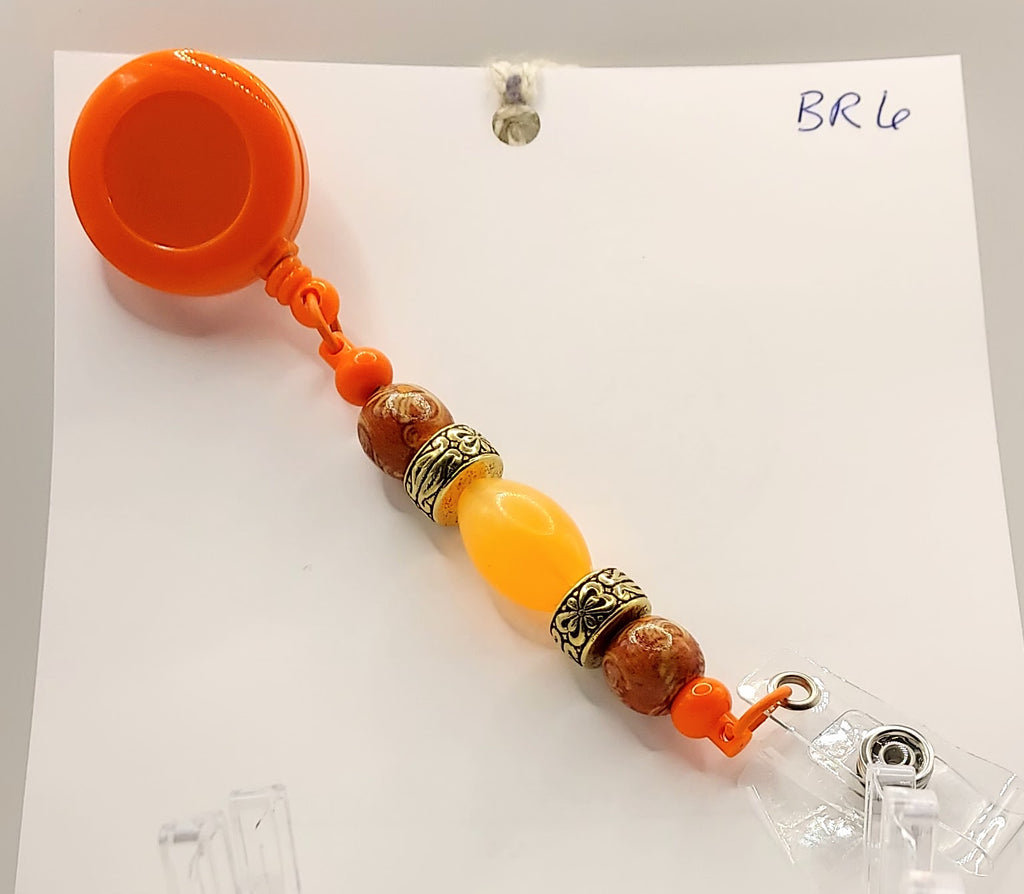 One of a Kind Orange Badge Reel