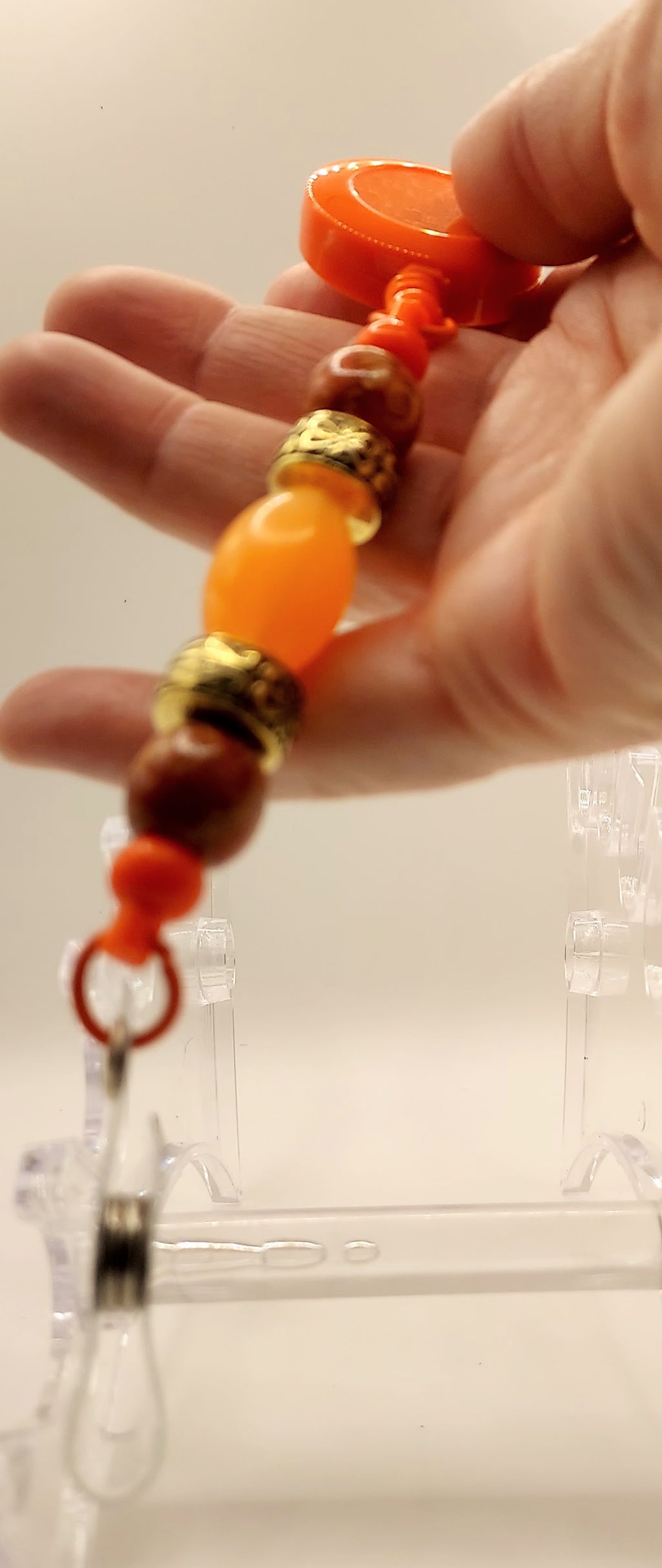One of a Kind Orange Badge Reel