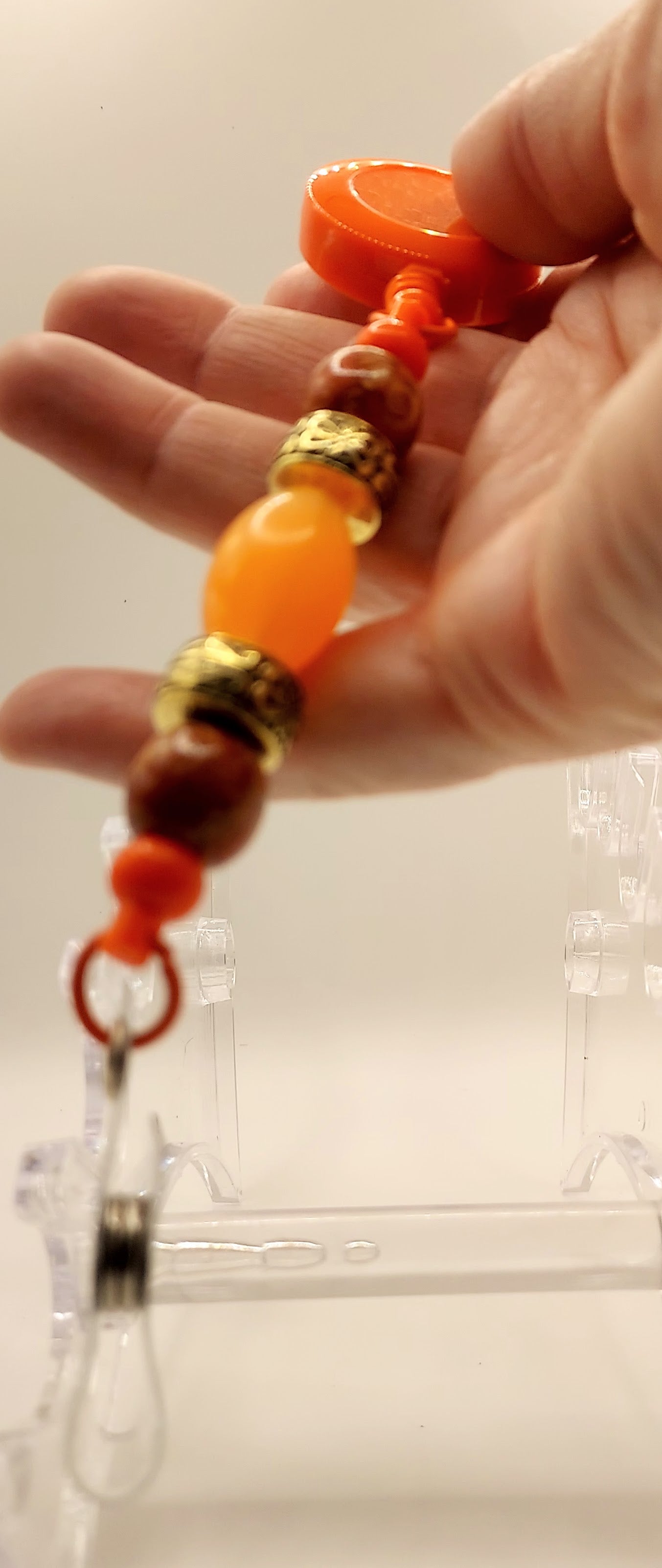 One of a Kind Orange Badge Reel