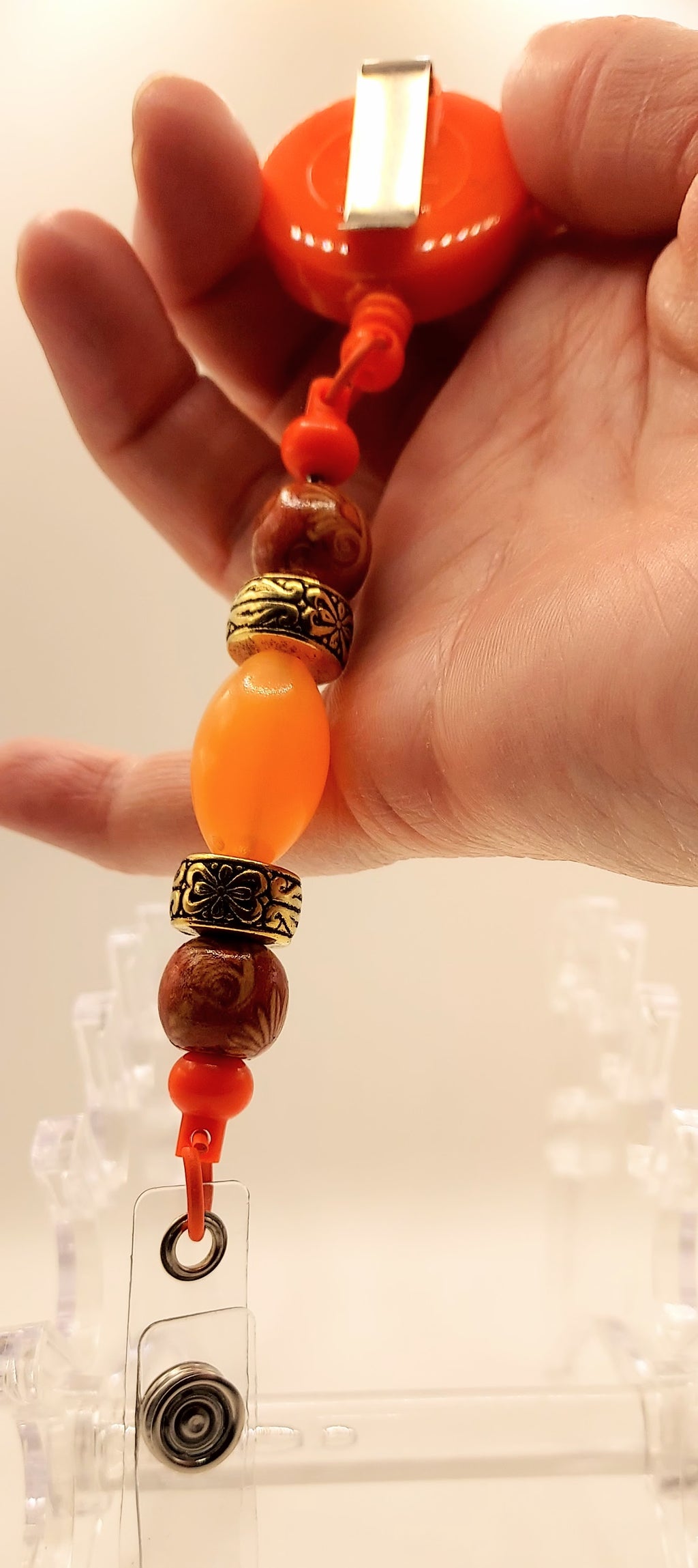 One of a Kind Orange Badge Reel
