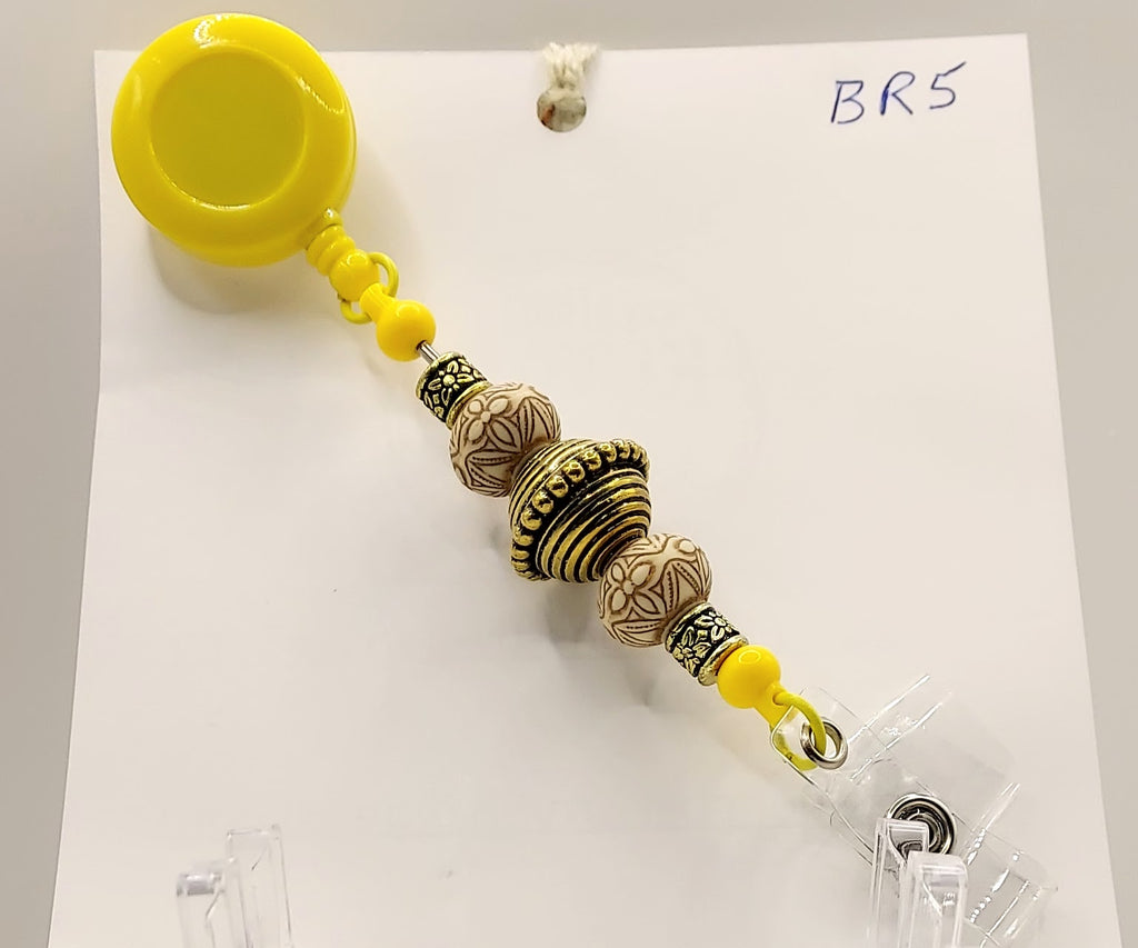 Unique Sunny Yellow and Gold Fidget Badge Reel