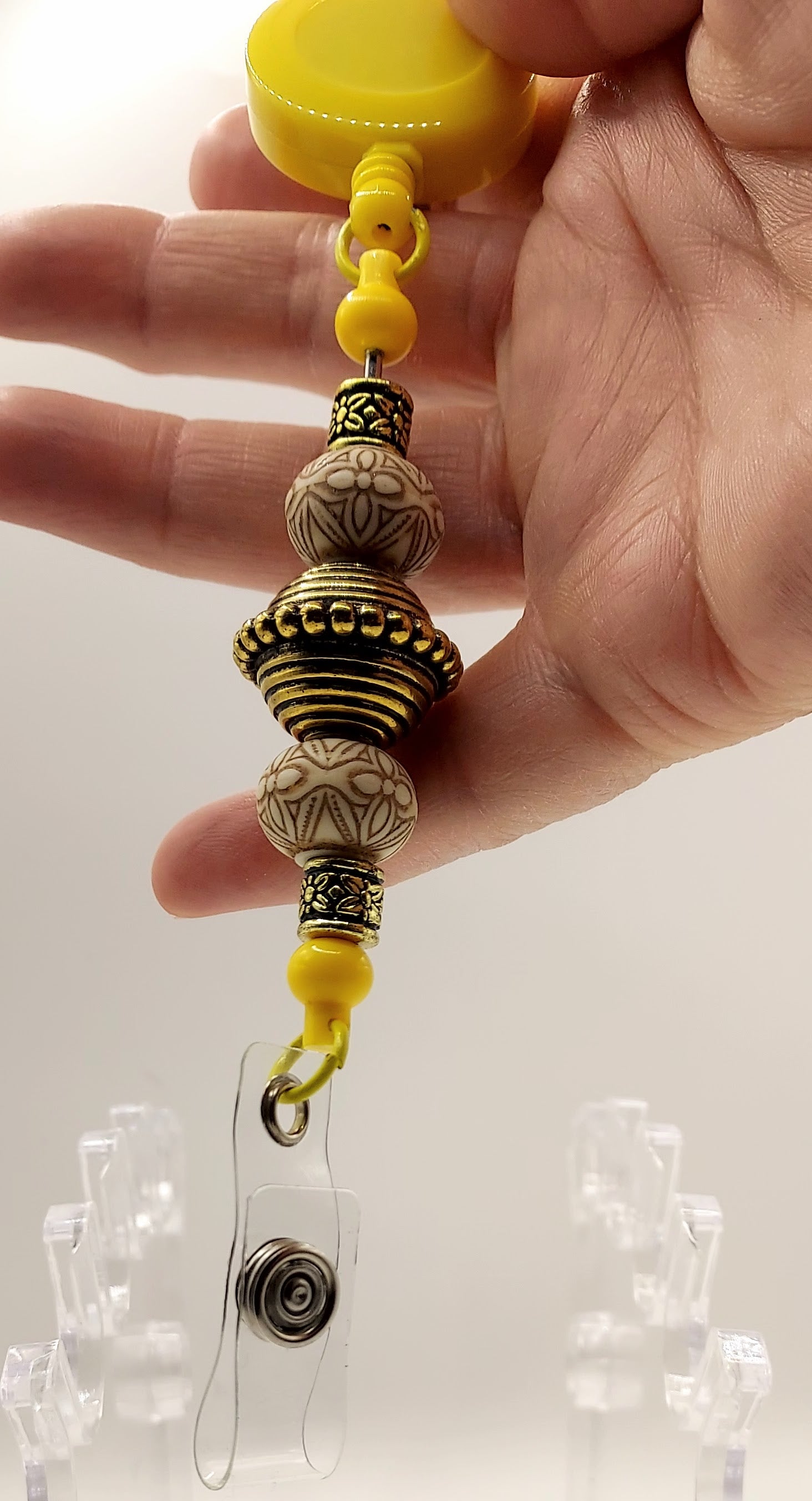 Unique Sunny Yellow and Gold Fidget Badge Reel