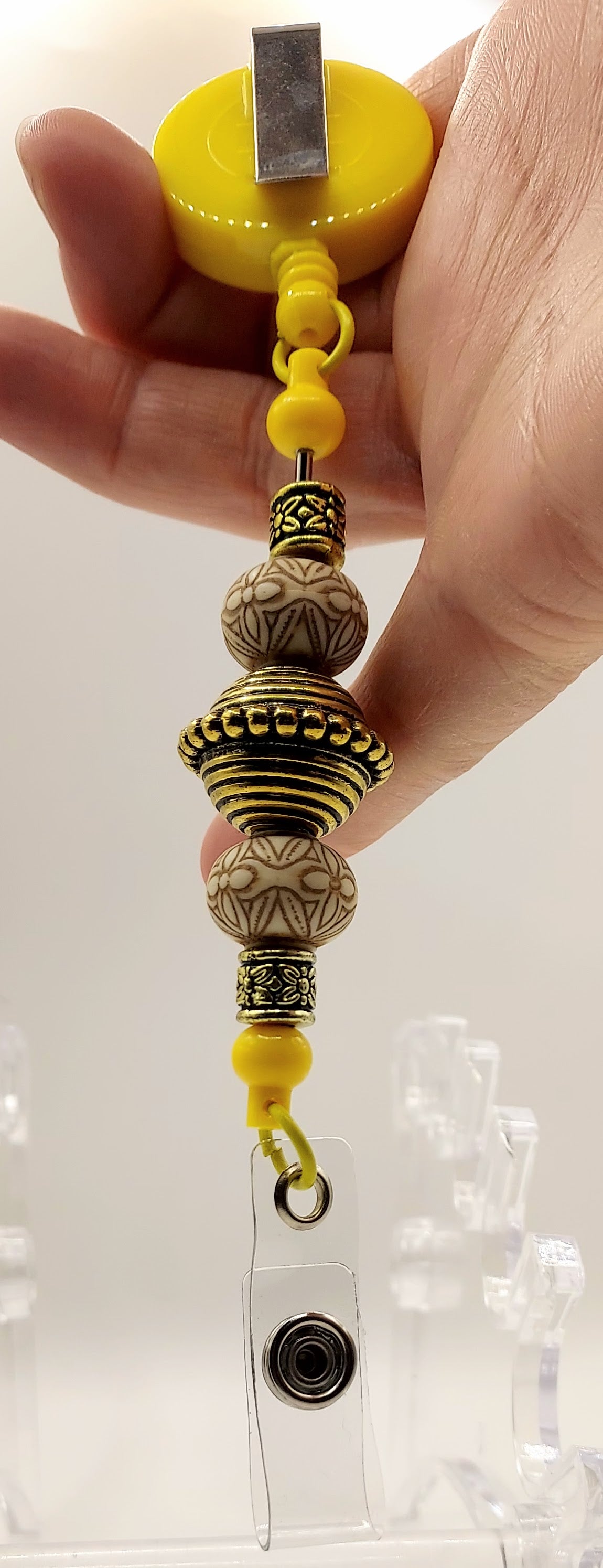 Unique Sunny Yellow and Gold Fidget Badge Reel